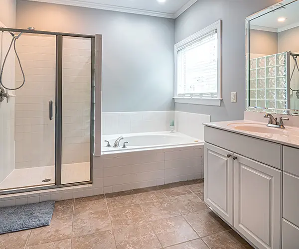 A cozy home bath tub and shower with slippery floor